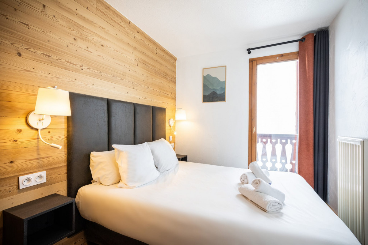 APPARTEMENT 12/14 PERSONNES 115M² - © @Val Chavière APPARTEMENT 12/14 PERSONNES 115M²