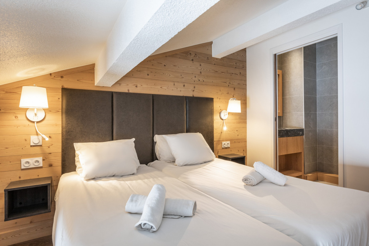 APPARTEMENT 12/14 PERSONNES PRESTIGE 160M² - © @Val Chavière APPARTEMENT 12/14 PERSONNES PRESTIGE 160M²