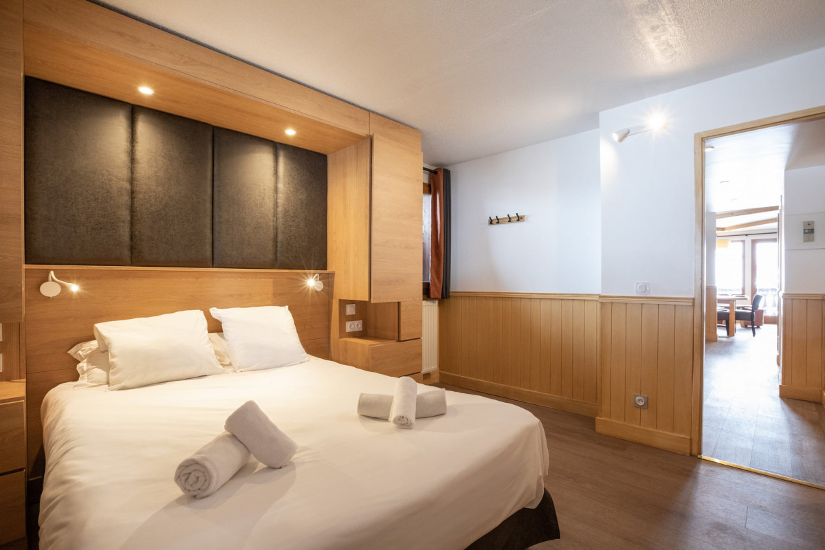 Appartement 4/6 personnes 58m² - © @Val Chavière Appartement 4/6 personnes 58m²